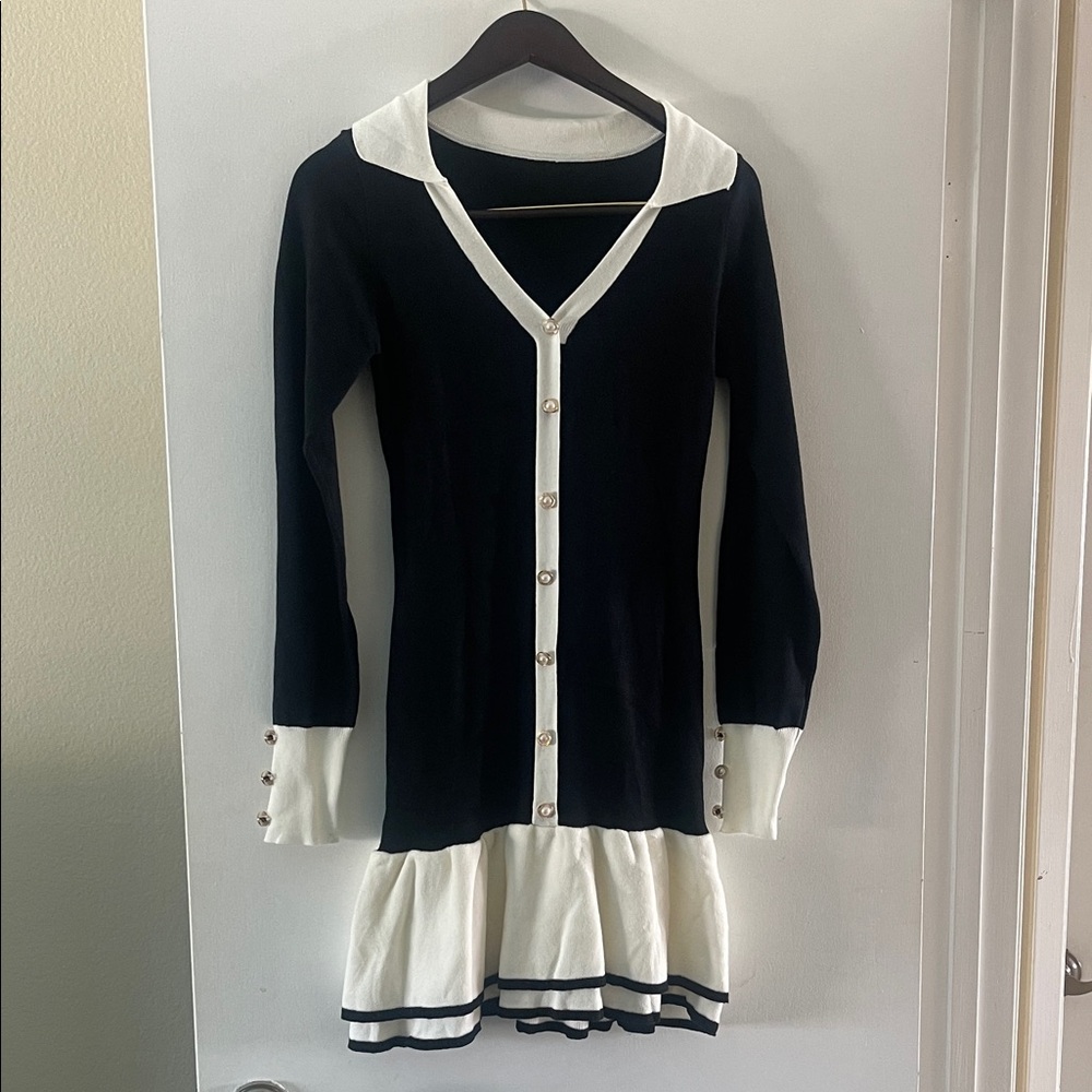 Elegant Black and White Dress with Pearl Buttons